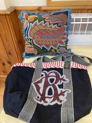 Christine Boyd made the bag and tapestry cushion